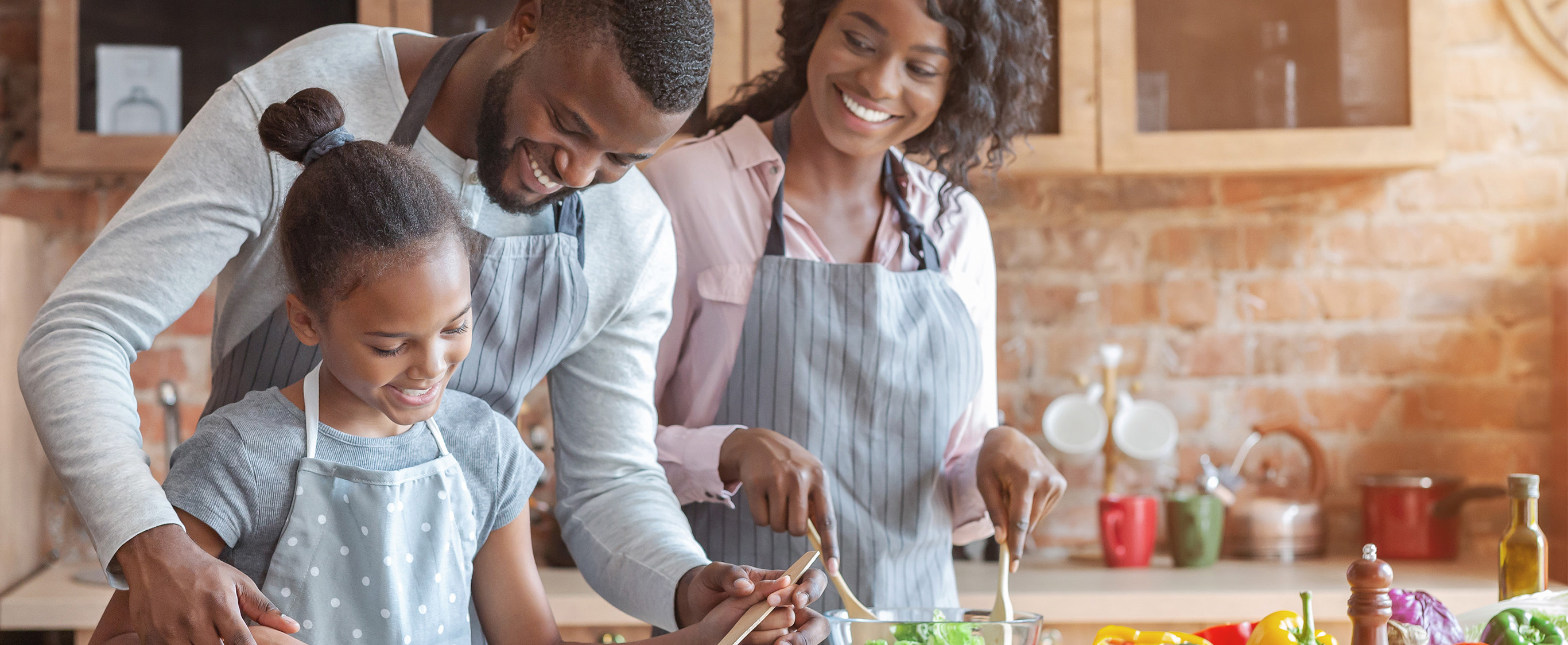 Home Banner - Family in Kitchen